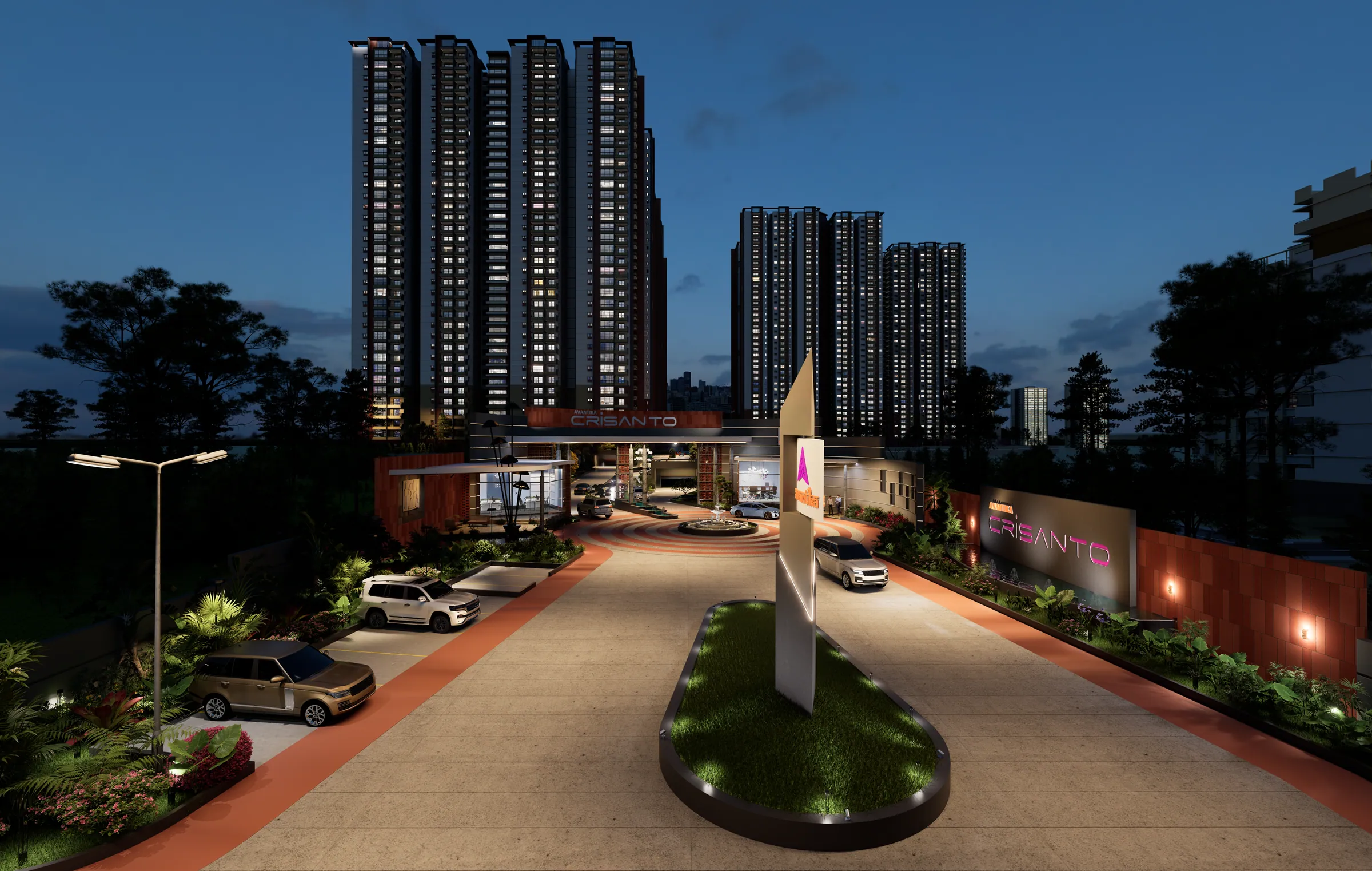 Entrance drive and rotary at night