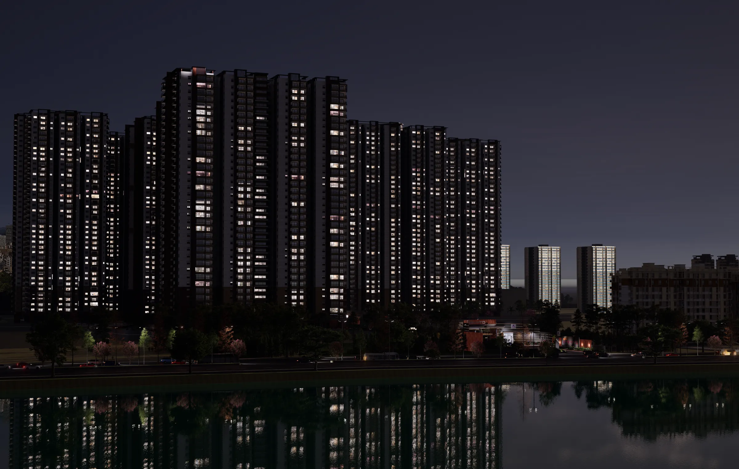 Towers across the lake at night